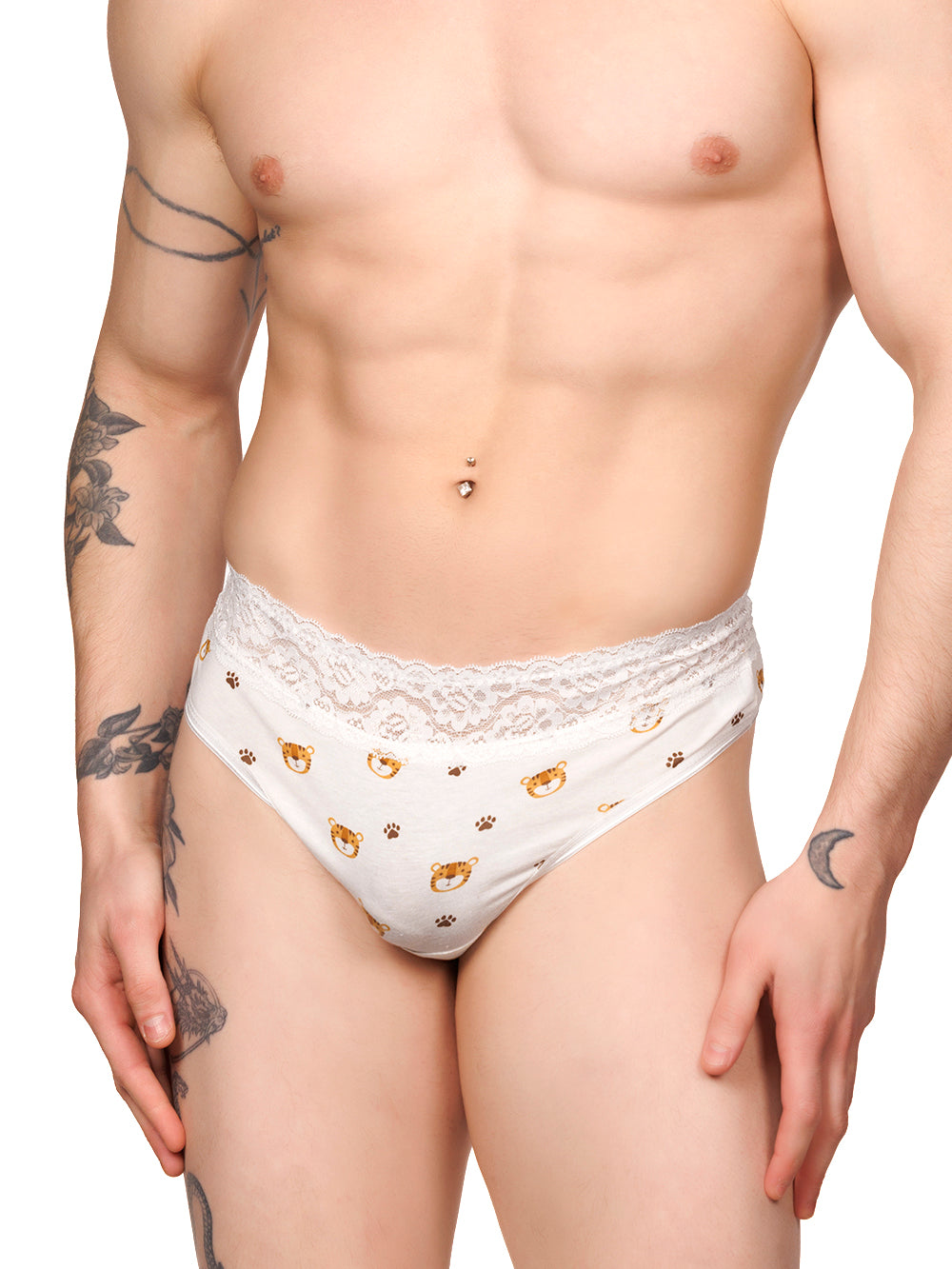 Front view of a male model wearing white XDress thong panties with a matching lace waistband and tiger print