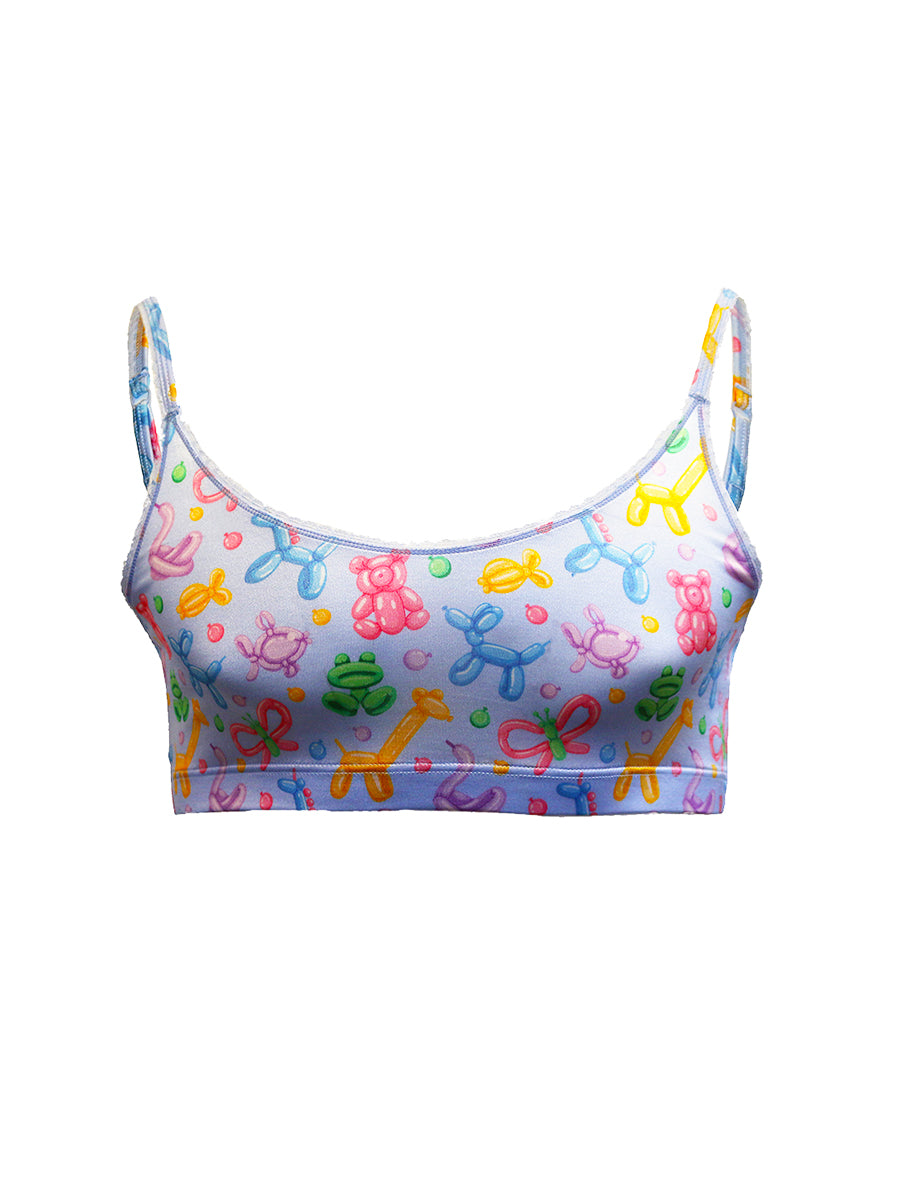 A light blue satin bra for men with a colorful balloon animal pattern, on a white background.