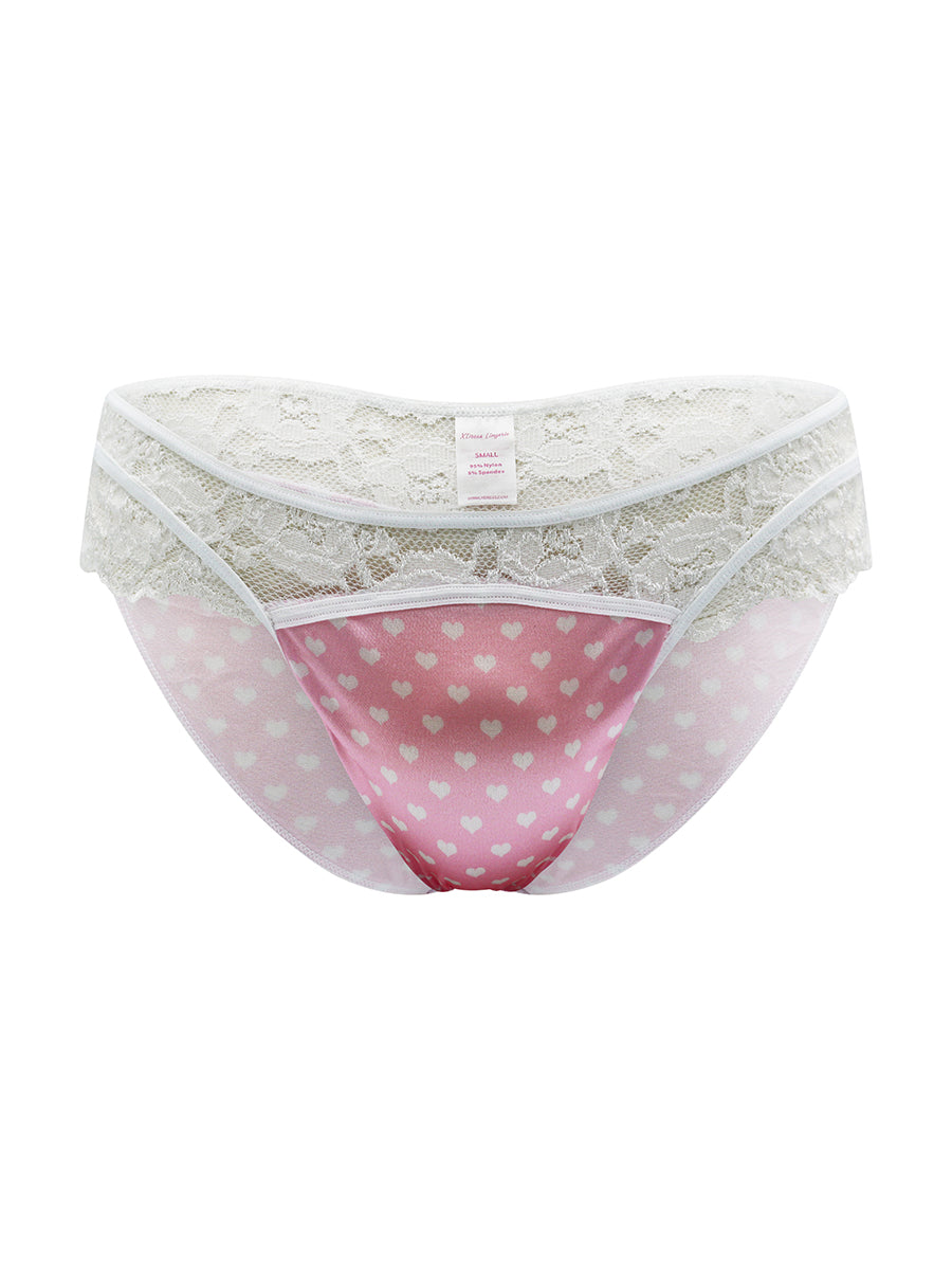 Lace-trimmed underwear with pink interior featuring white heart patterns on a white background