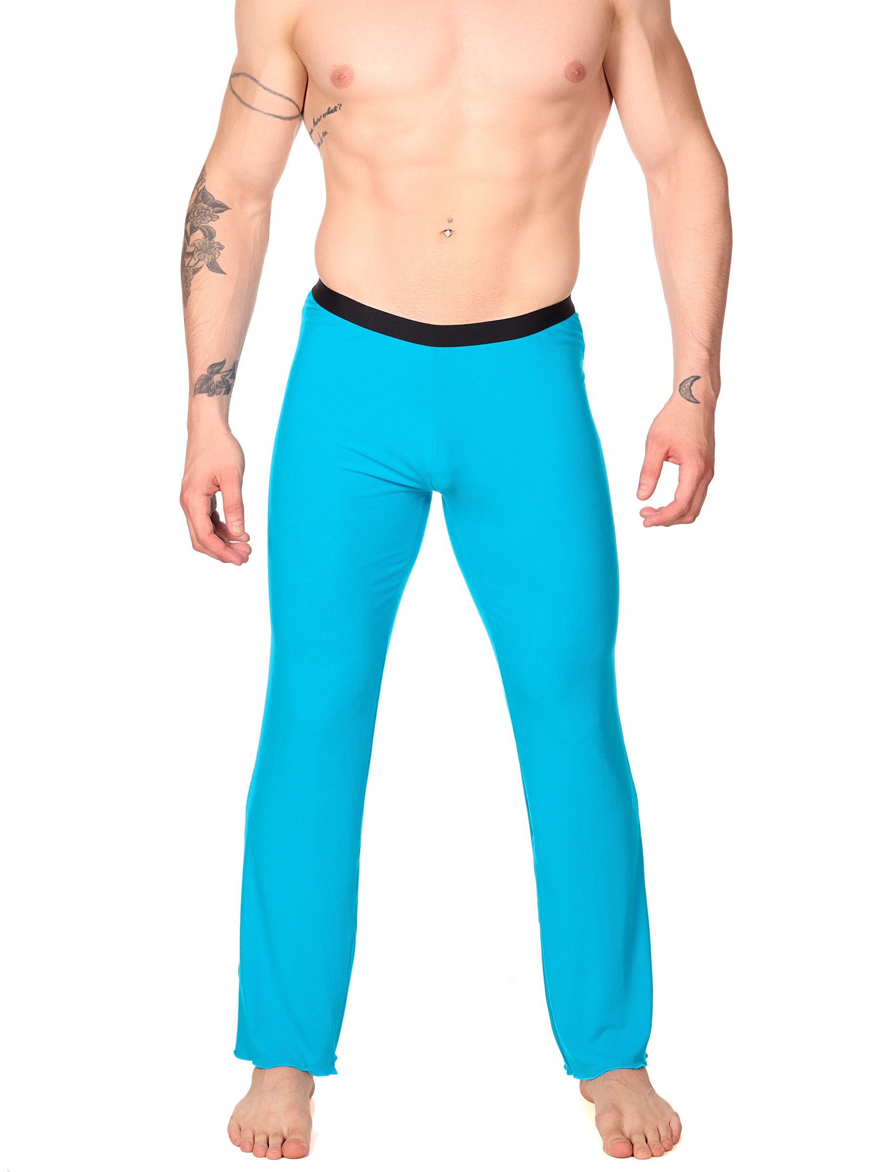 Front view of a man wearing turquoise XDress lounge pants with black waistband