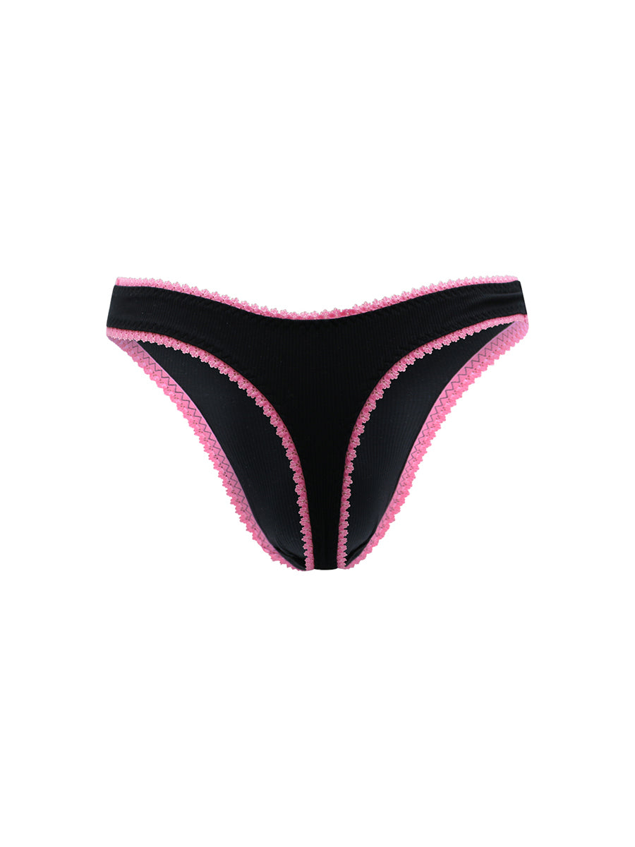 Back view of black thong panties with pink lace trim on a white background.