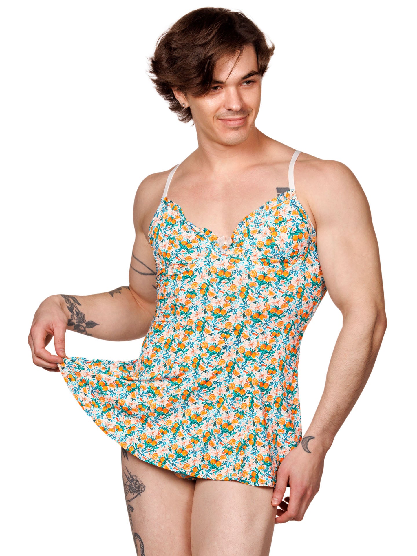 Front view of a male model wearing an XDress babydoll with a vibrant orange blossom pattern.