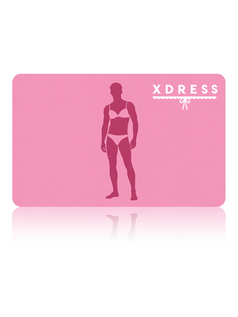 A pink rectangular card or label with rounded corners, featuring a dark pink silhouette of a person in a bikini and the white text 'XDRESS' with a small bow graphic. The card is centered on a white background with a faint reflection below.