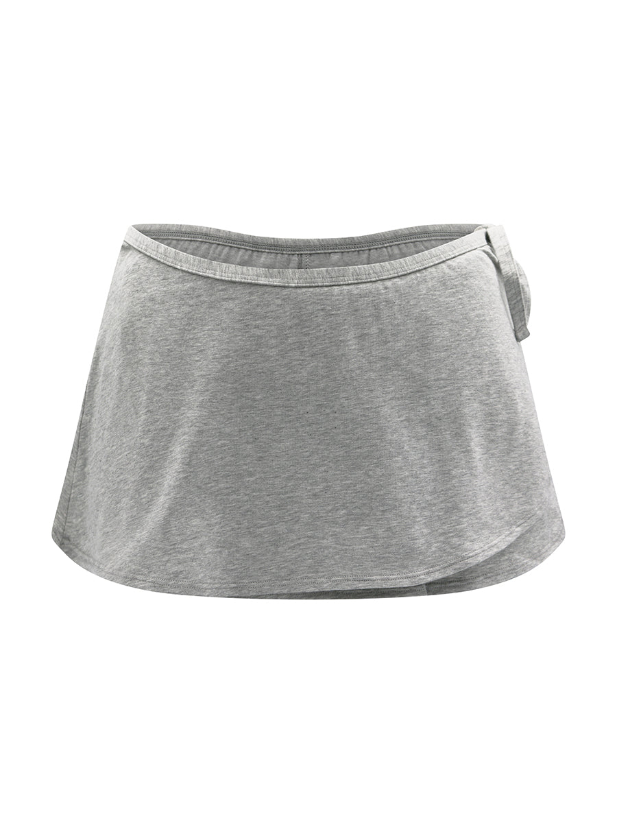 Front view of a grey athletic skort on a white background.