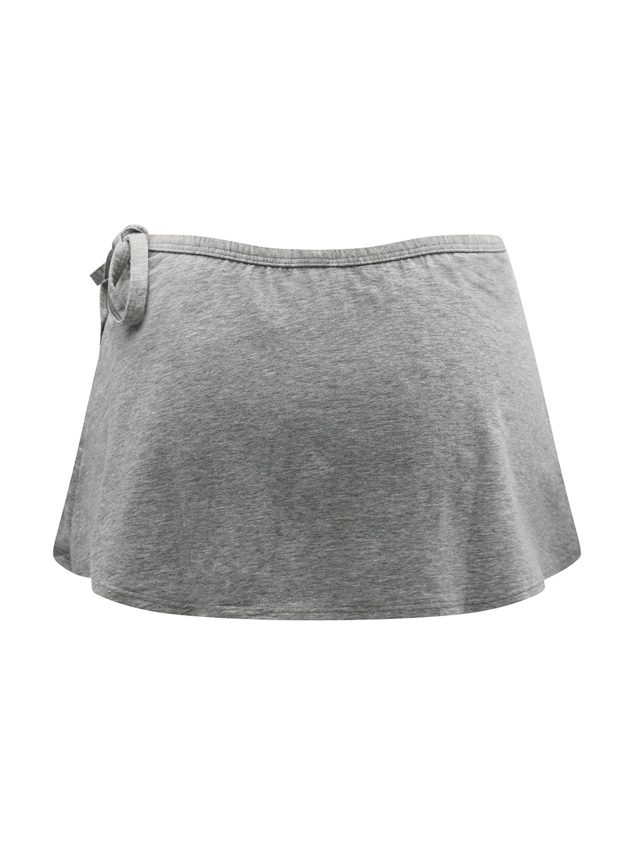 Back view of a grey athletic skort on a white background.