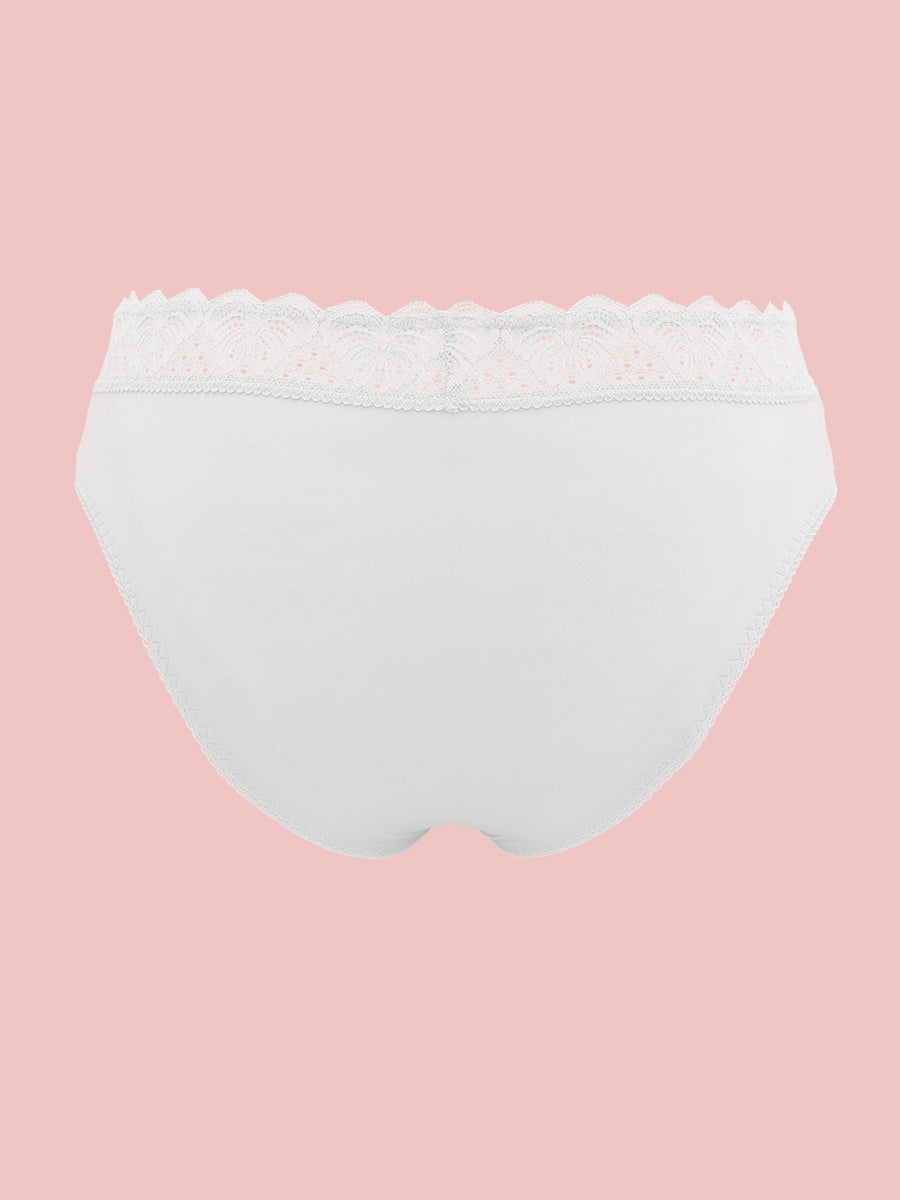 White XDress men's panties on a pink background.