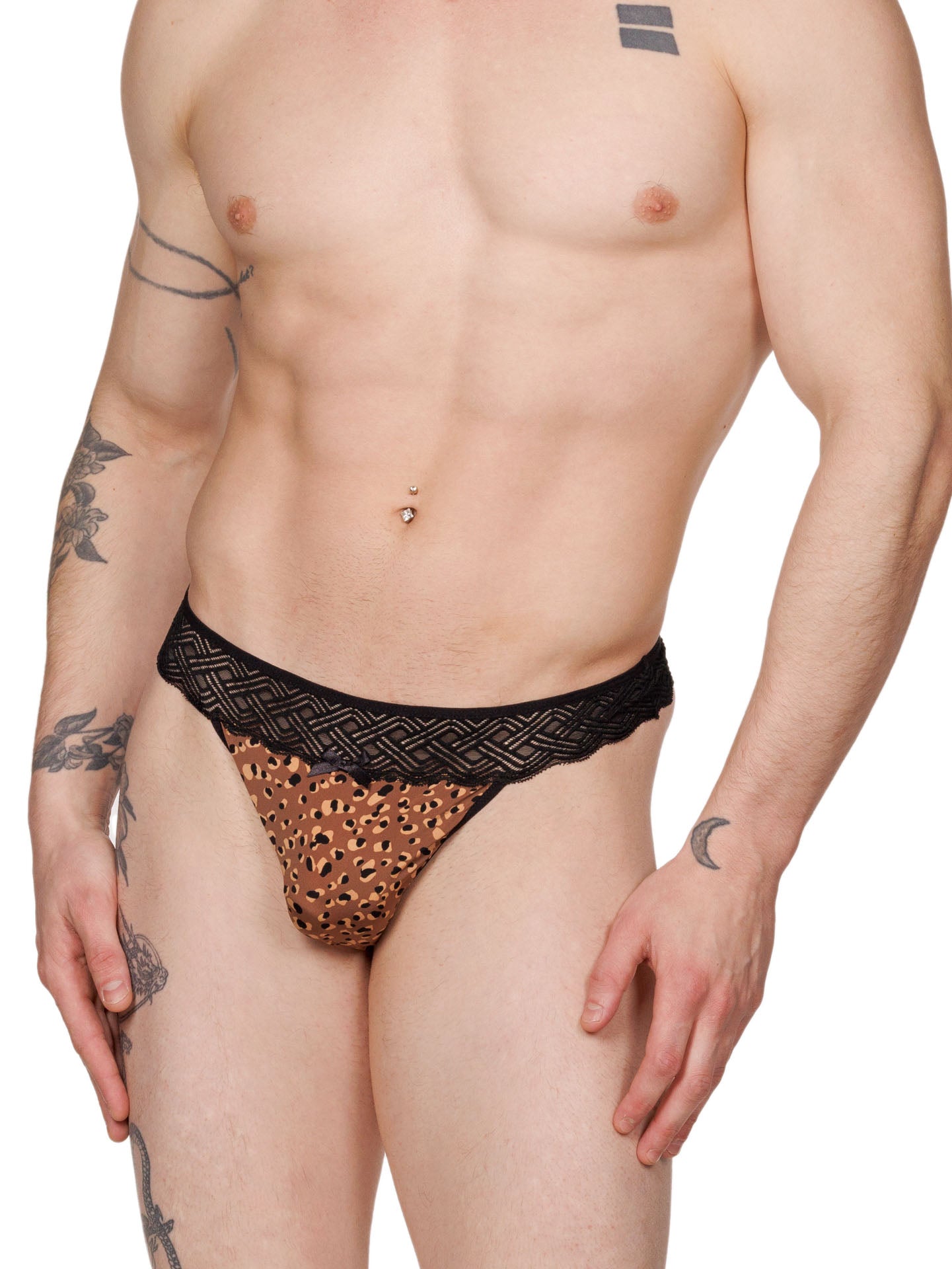 Front view of a male model wearing an XDress lace thong with leopard print pattern