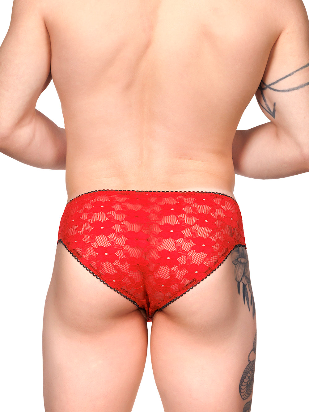 Back view of a male model wearing XDress red lace panties with black picot trim